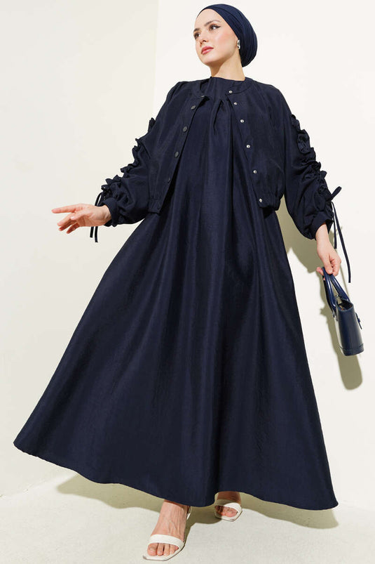 Completo gilet e giacca blu navy con maniche arricciate