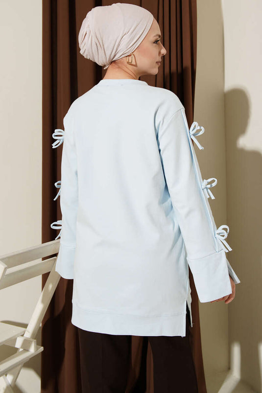 Tunika mit Schleifendetails an den Ärmeln in Babyblau