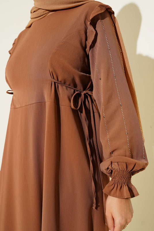 Nerzkleid mit glänzenden Paillettenärmeln