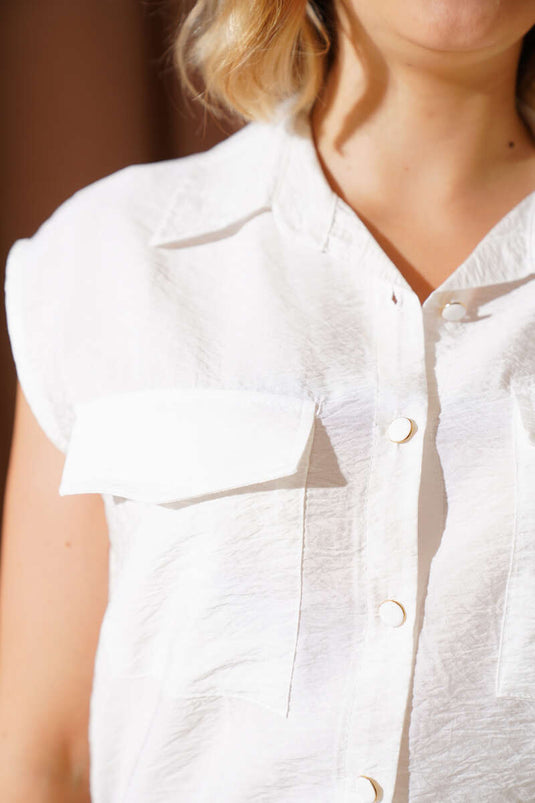 Camicia senza maniche con doppie tasche sul petto, bianca