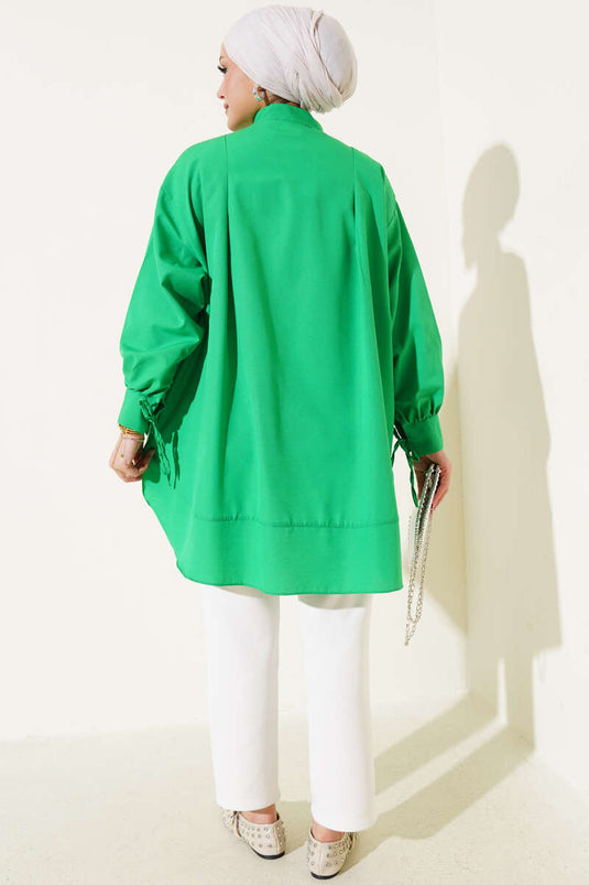 Tunica con spacco e maniche con lacci in corda verde