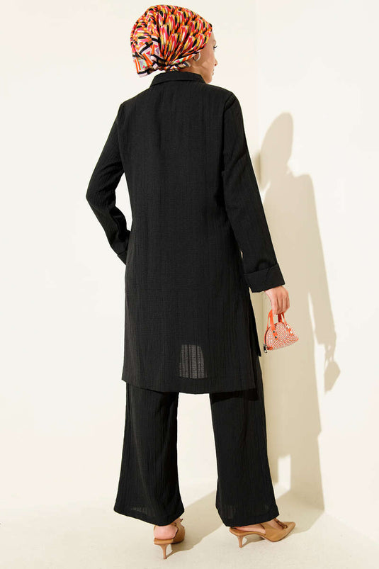 بدلة سوداء من قطعتين بسحاب نصف مجعد