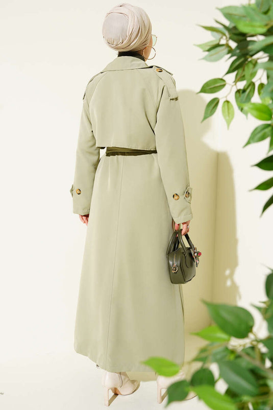 Trench-coat croisé avec cape et ceinture, vert clair.