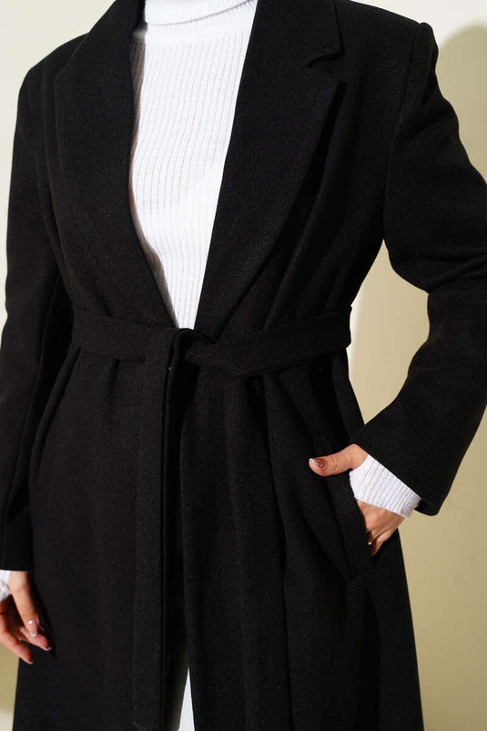 Manteau en cachemire noir à double boutonnage et poches