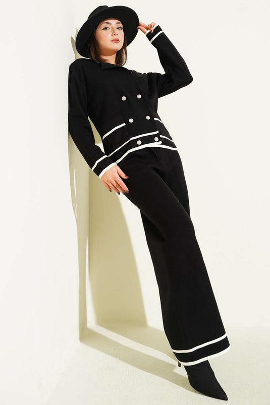 Schwarzer, zweireihiger Strickanzug mit Knopfleiste