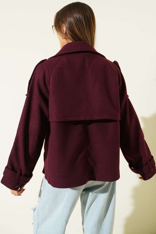Double-breasted short coat, plum color.