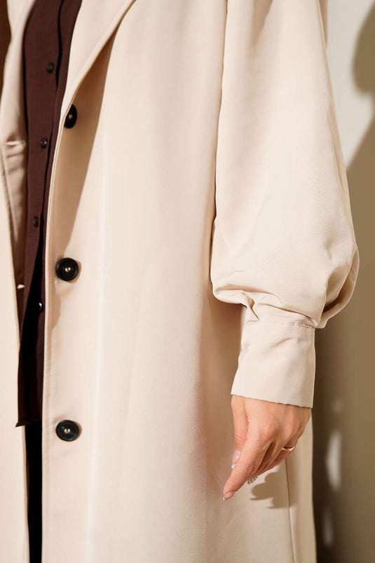 Trench-coat croisé avec ceinture, beige.