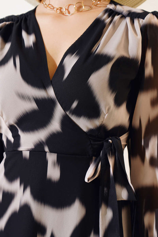 Vestido cruzado de tul negro de manga larga