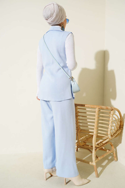 Traje de punto de dos piezas con chaleco y doble botonadura en azul