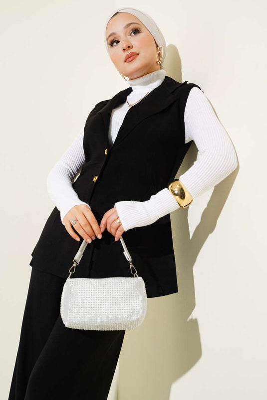 Traje de punto de dos piezas con chaleco y doble botonadura, color negro