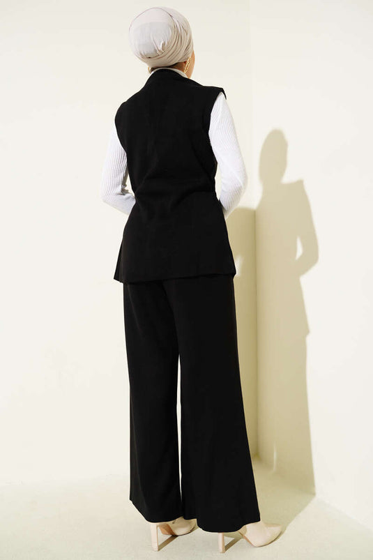 Traje de punto de dos piezas con chaleco y doble botonadura, color negro