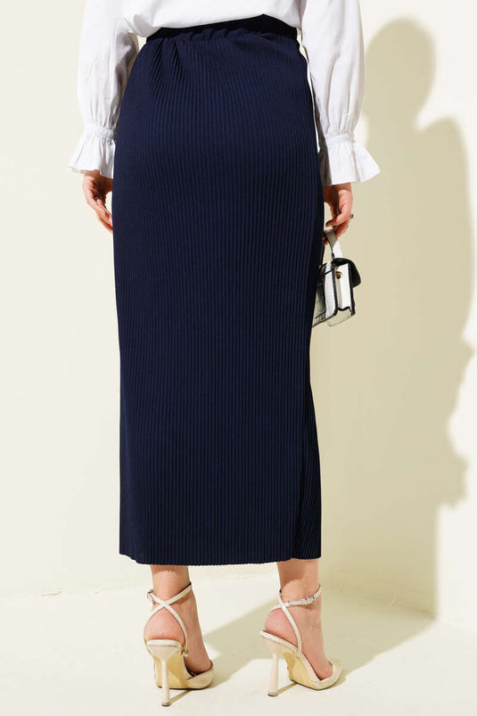 Falda tubo de tela plisada azul marino