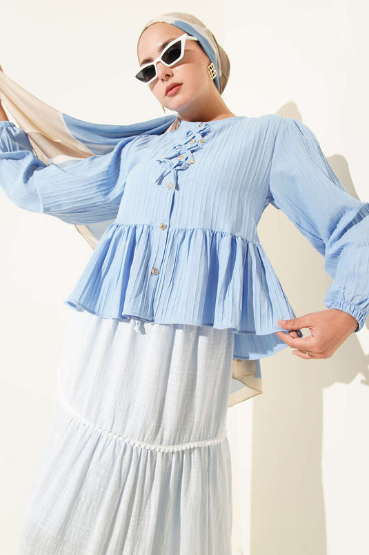 Camisa con detalle de lazo y volante, azul