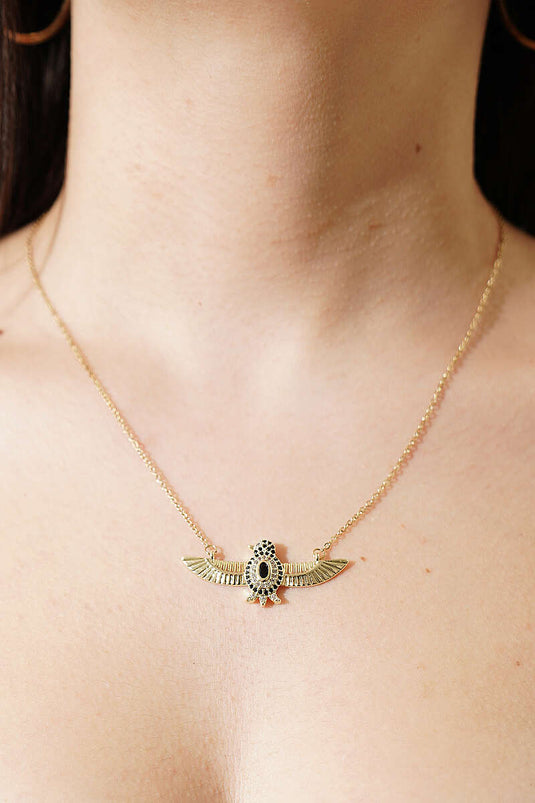 Collana con pietre e pendente a forma di uccello oro