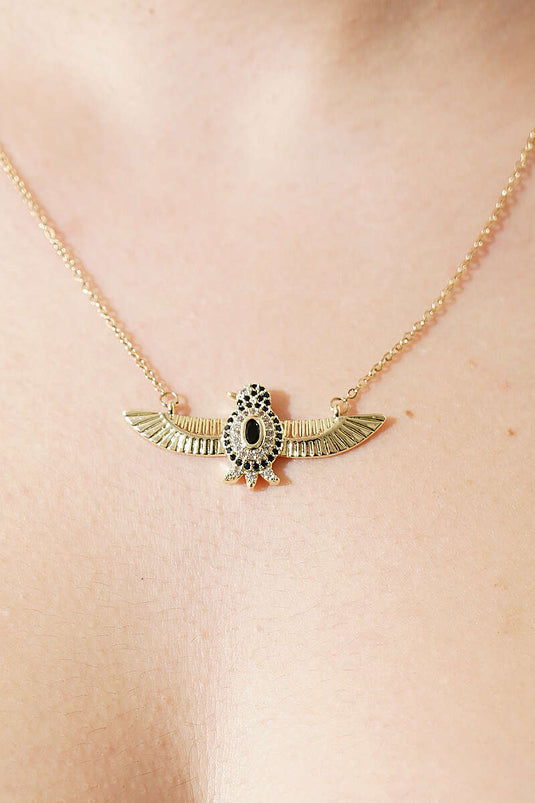 Collana con pietre e pendente a forma di uccello oro