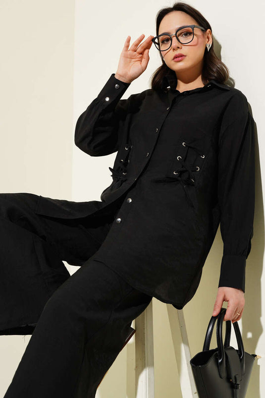 طقم تونيك مكون من قطعتين بتفاصيل فتحات باللون الأسود