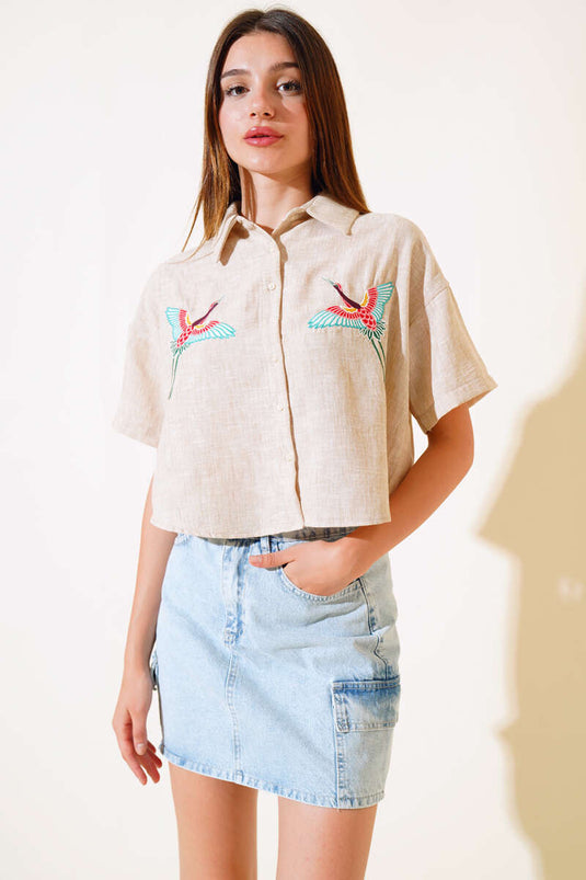 قميص بسكويت مطرز على شكل طائر
