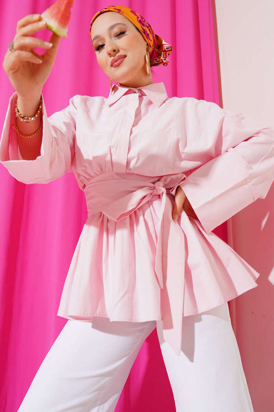 تونيك وردي بنصف أزرار وحزام مكشكش