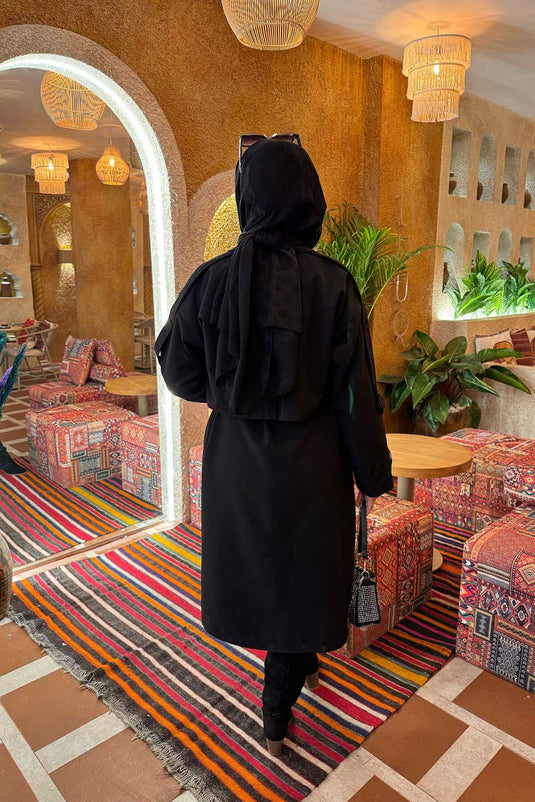 Trench-coat noir à ceinture et épaulettes détaillées