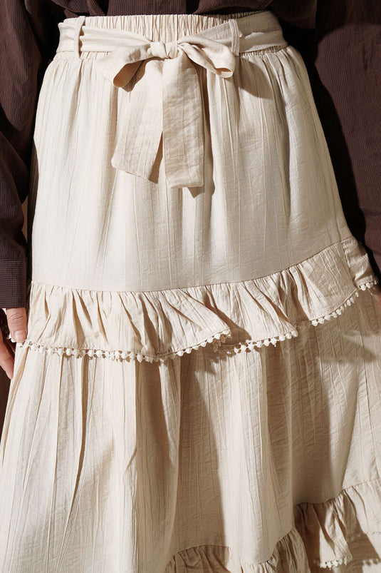 Jupe évasée à volants avec ceinture beige