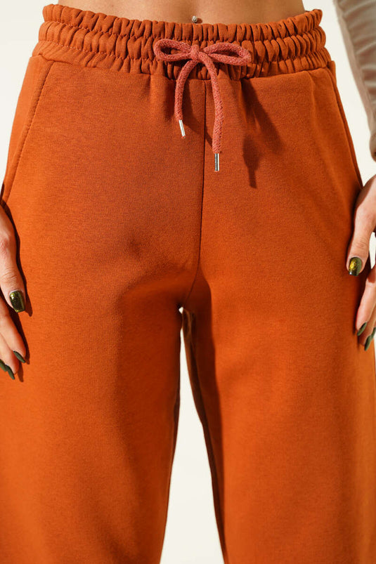 بنطال رياضي مطاطي بثلاثة خيوط، لون بني فاتح