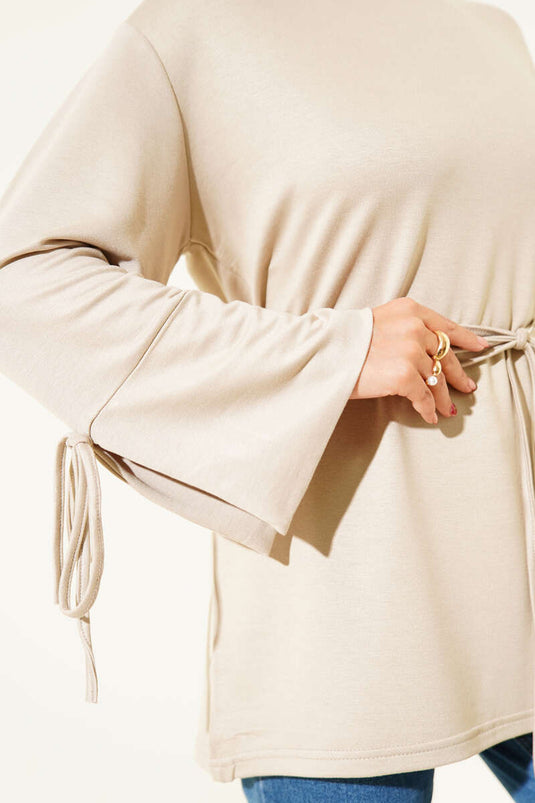 Túnica Loysha con cuerda atada a la muñeca y piedra