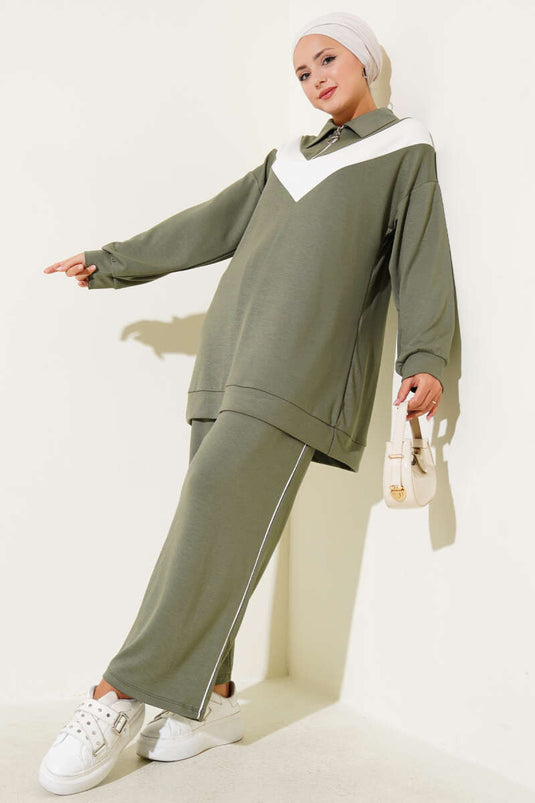 Loyşa tweedelig pak met rits en V-streep, amandelgroen