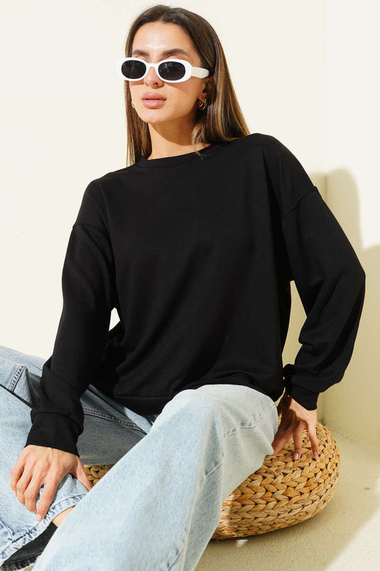 سويت شيرت لويشا أسود فضفاض