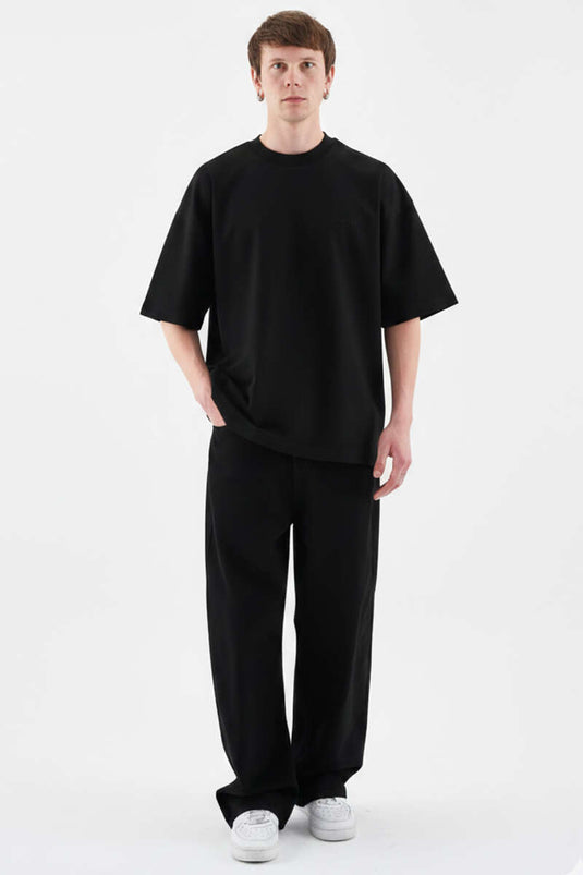 قميص رجالي واسع الحجم مطرز من ماكينة الخياطة باللون الأسود