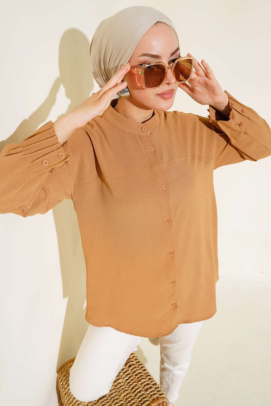 تونيك مع الكفة متجمعة الجمل