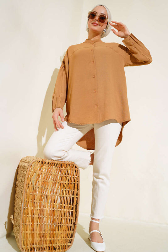 تونيك مع الكفة متجمعة الجمل