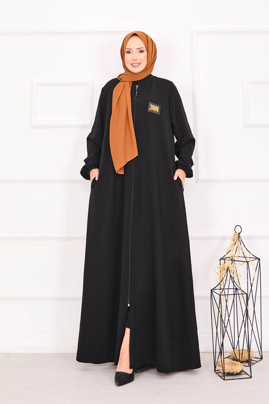 Abaya hijab noire à poches et poignets élastiques