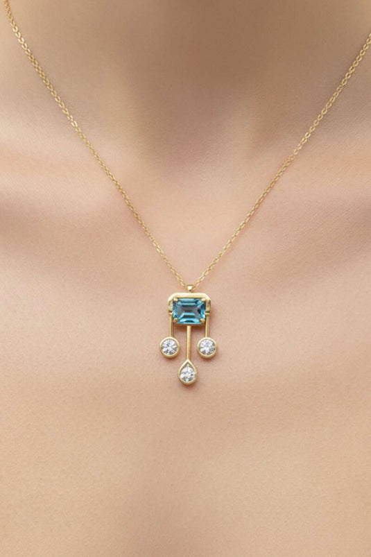 Gold Pendant Necklace with Blue Stones