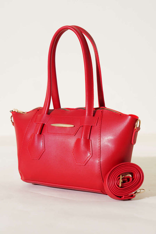 Bolsa con cremallera y emblema de metal rojo