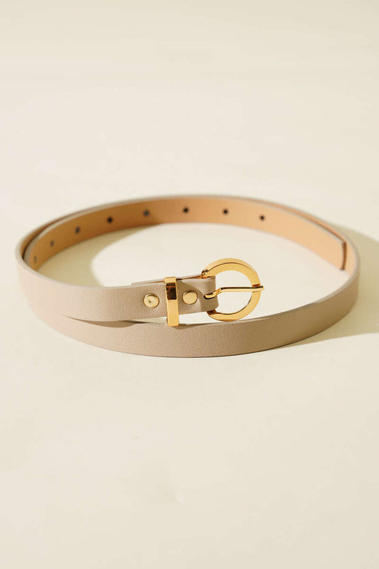 Ceinture fine beige à boucle ronde en métal
