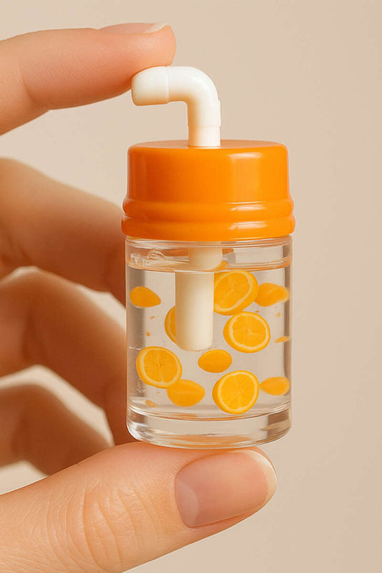 مرطب شفاه بنقشة فواكه برتقالية