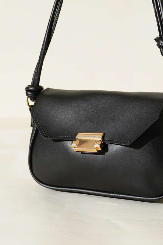 حقيبة سوداء بمقبض مزدوج وإغلاق مغناطيسي