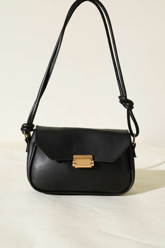 حقيبة سوداء بمقبض مزدوج وإغلاق مغناطيسي