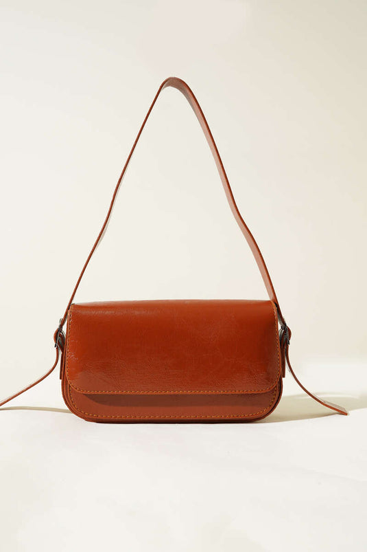 Sac magnétique en cuir beige