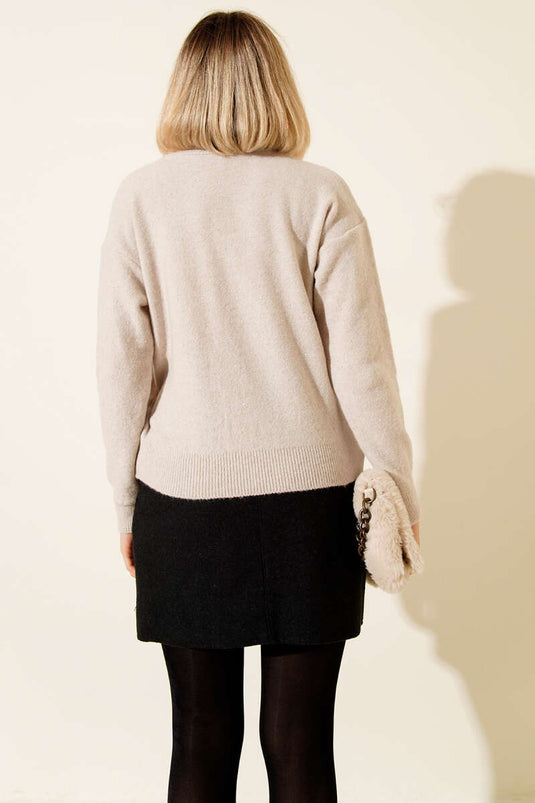 سترة صغيرة لامعة محبوكة