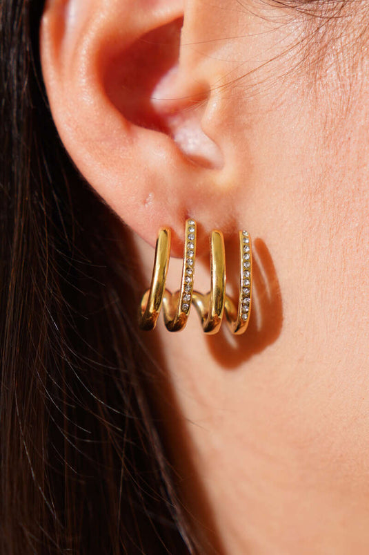 Boucles d'oreilles rayées ornées de mini-pierres