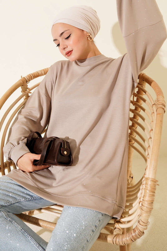 سترة لويشا مزينة بأحجار صغيرة، من فرو المنك