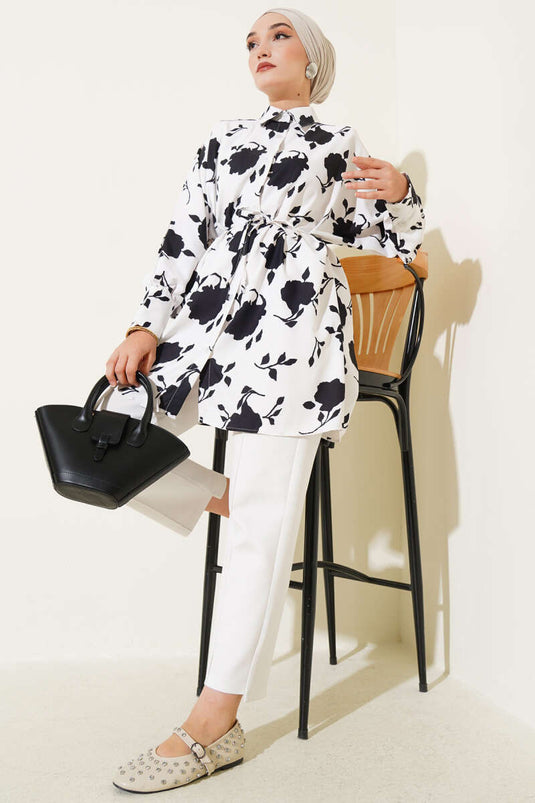 قميص أسود بحزام ونقشة أوراق صغيرة