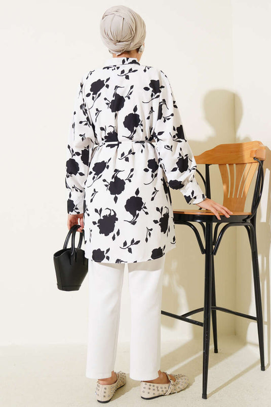 قميص أسود بحزام ونقشة أوراق صغيرة