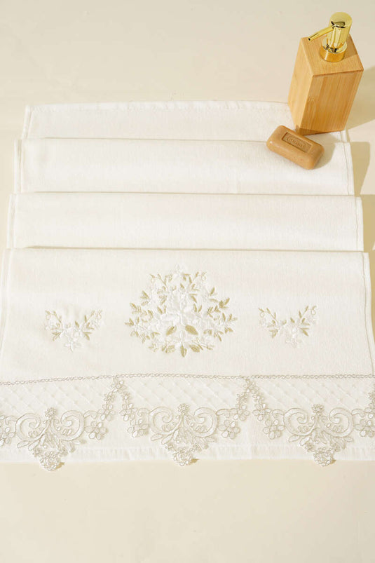 منشفة يد ووجه مطرزة في علبة ذهبية