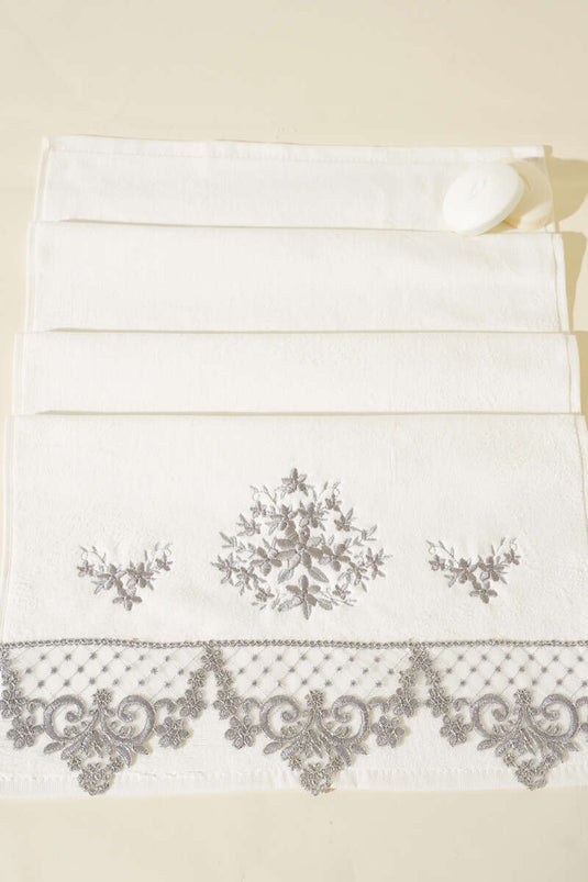 منشفة يد ووجه مطرزة في صندوق، فضي