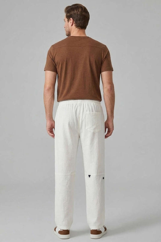 Pantaloni da uomo in lino ricamati bianchi