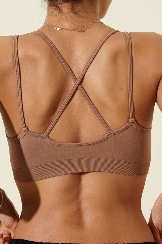 نBB صدرية بدون خياطة بحبال متقاطعة بلون فيزون