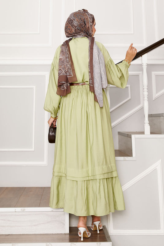 Ensemble jupe à manches ballon et détails côtelés vert pétrole