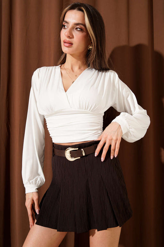 Blusa con arricciatura sulla spalla color ecrù